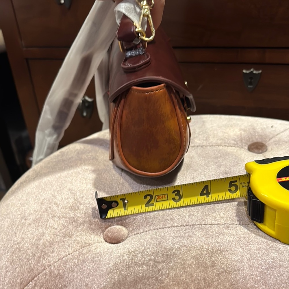 Brown Vegan Leather Clutch with Decorative Clasp and Structured Design - Picture 7 of 9